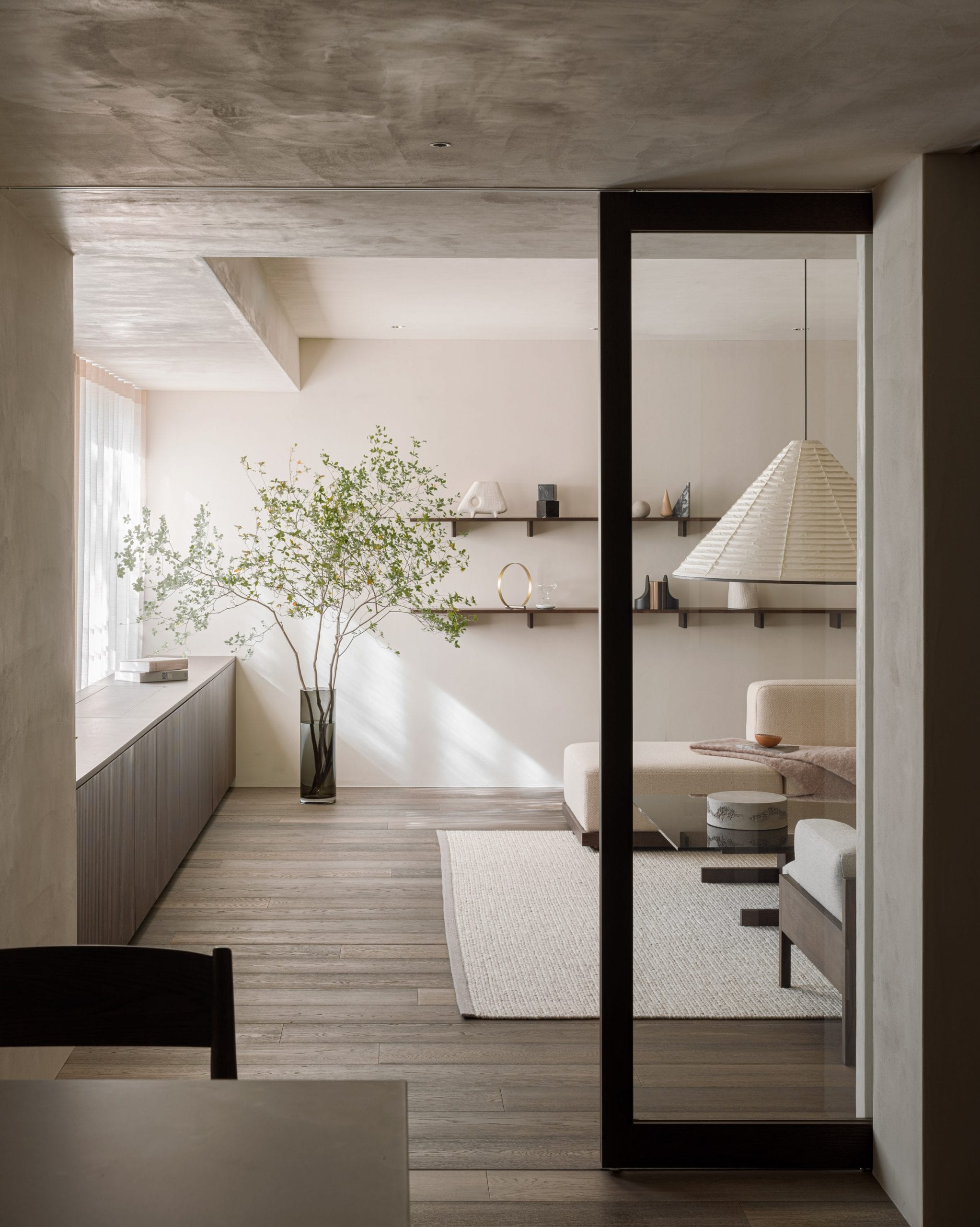 Wooden floor and white rug in Tokyo apartment