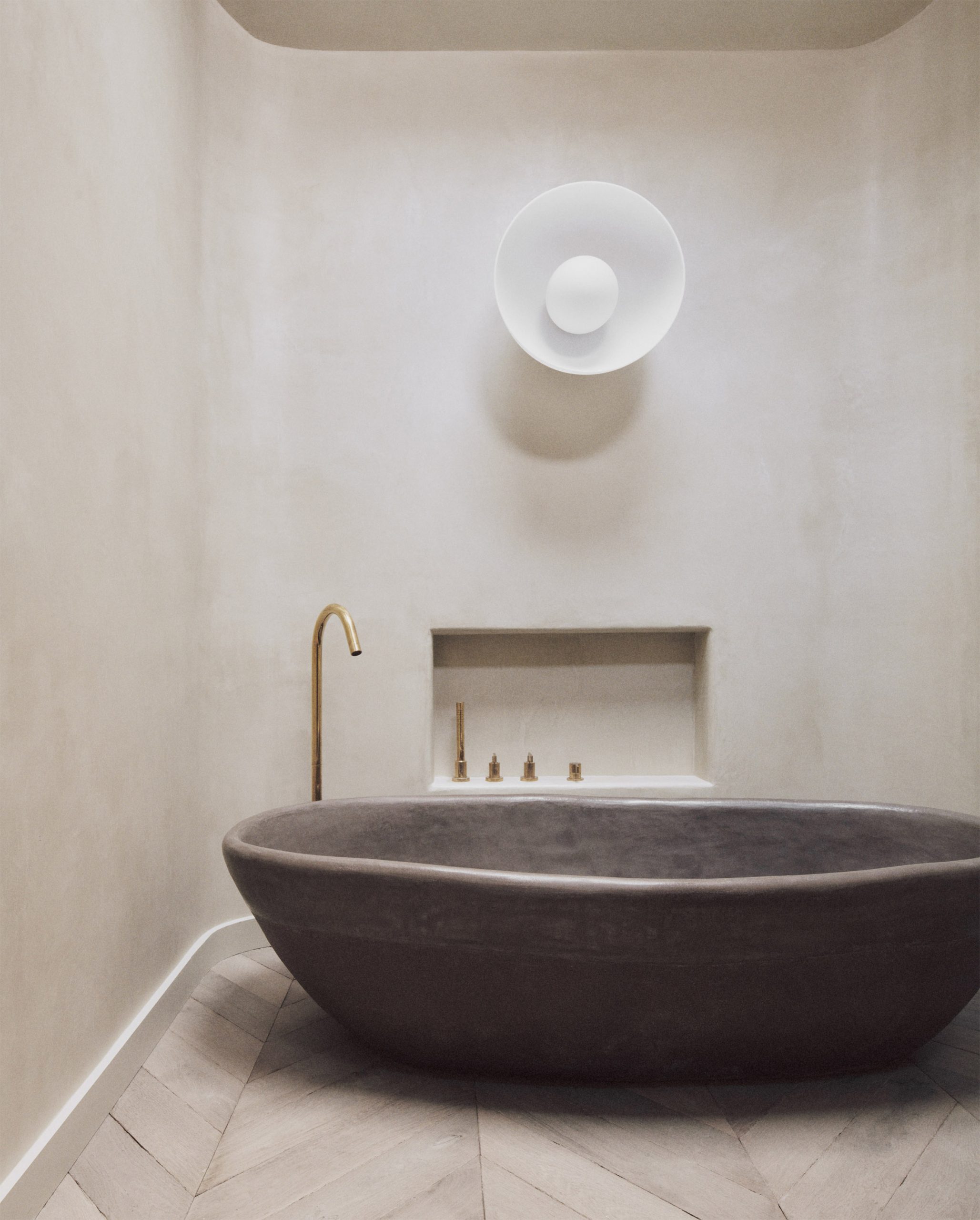 Bath made from sands, unfired clays, pigments and minerals