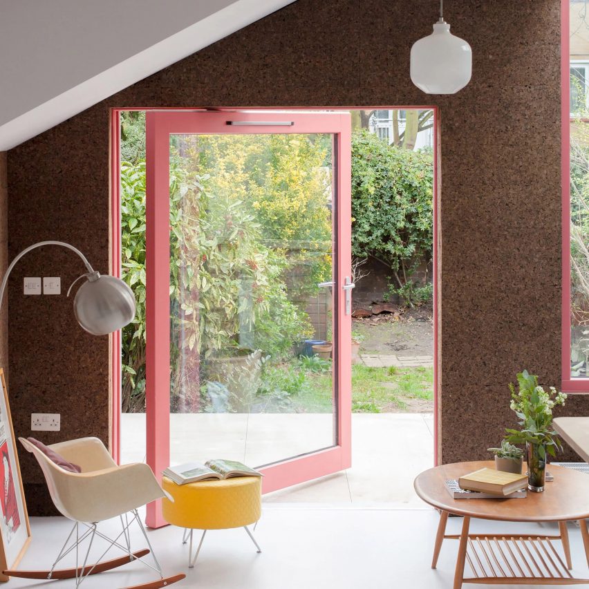 London home with a glass pivot door