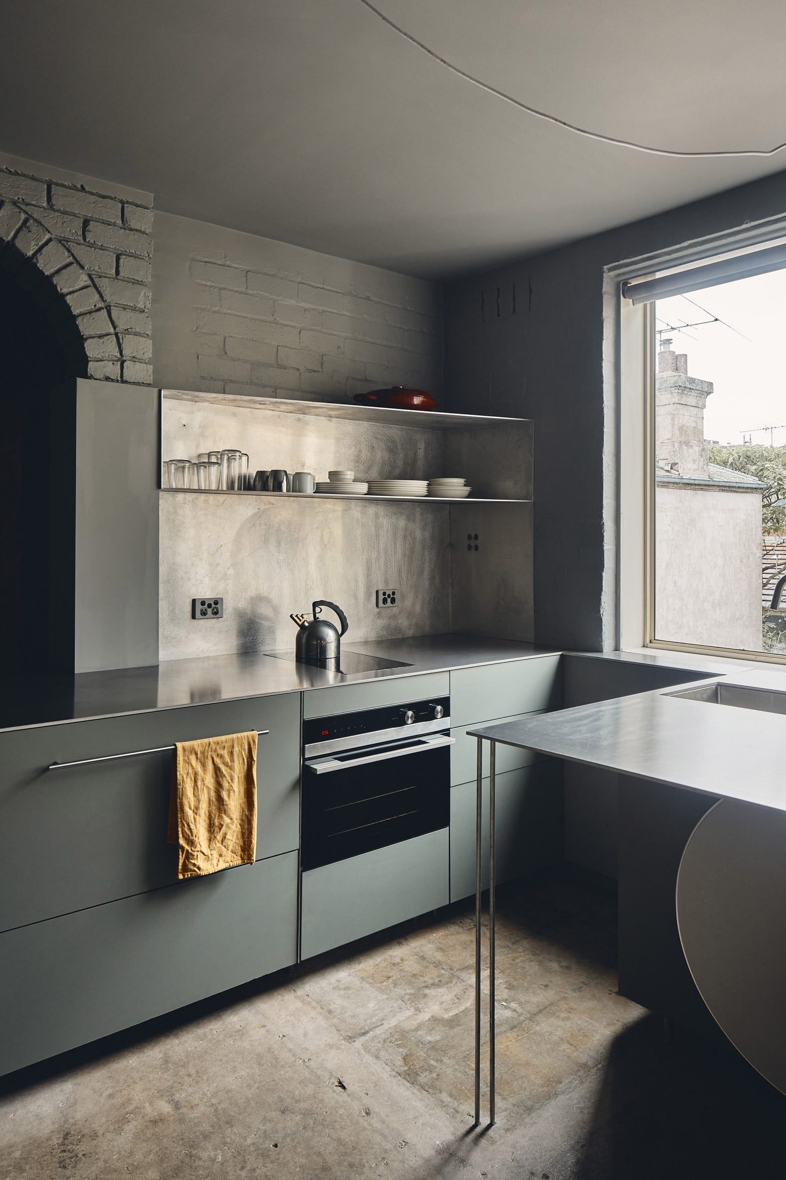 Microloft apartment in Melbourne by Studio Edwards with open kitchen shelving
