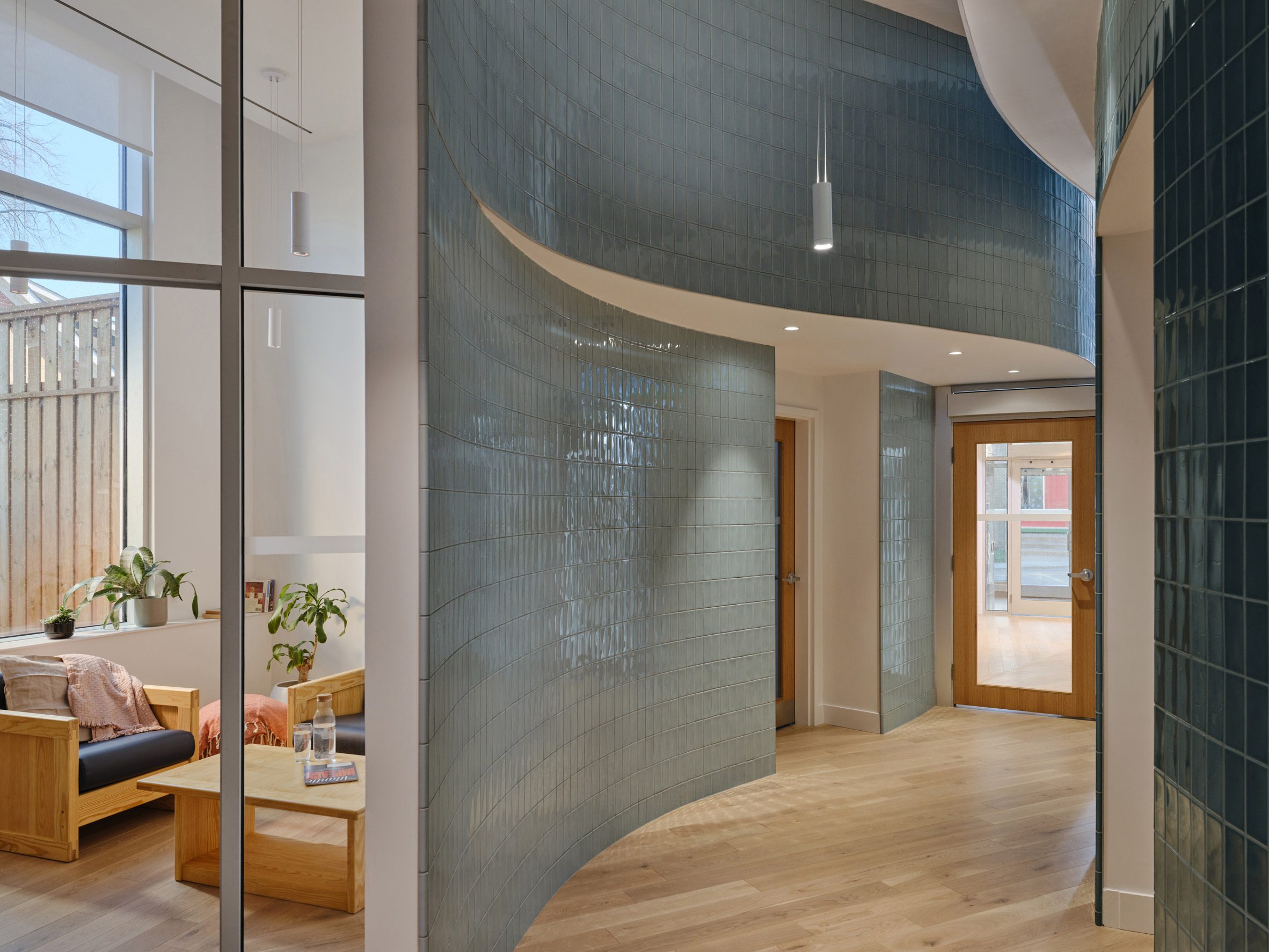 Winding entrance corridor providing access to private rooms