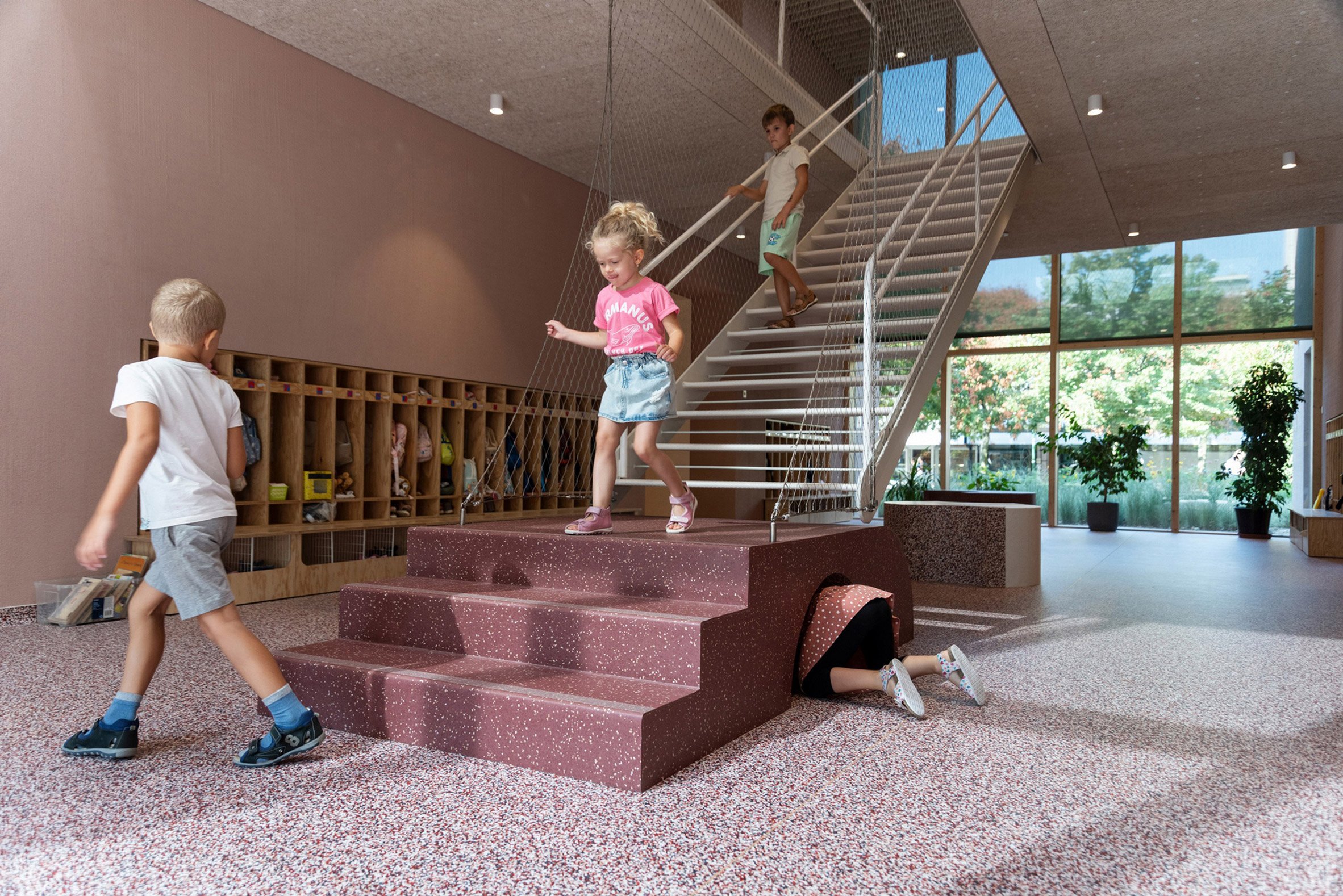 Children playing within Gyöngyszem Kindergarten in Hungary