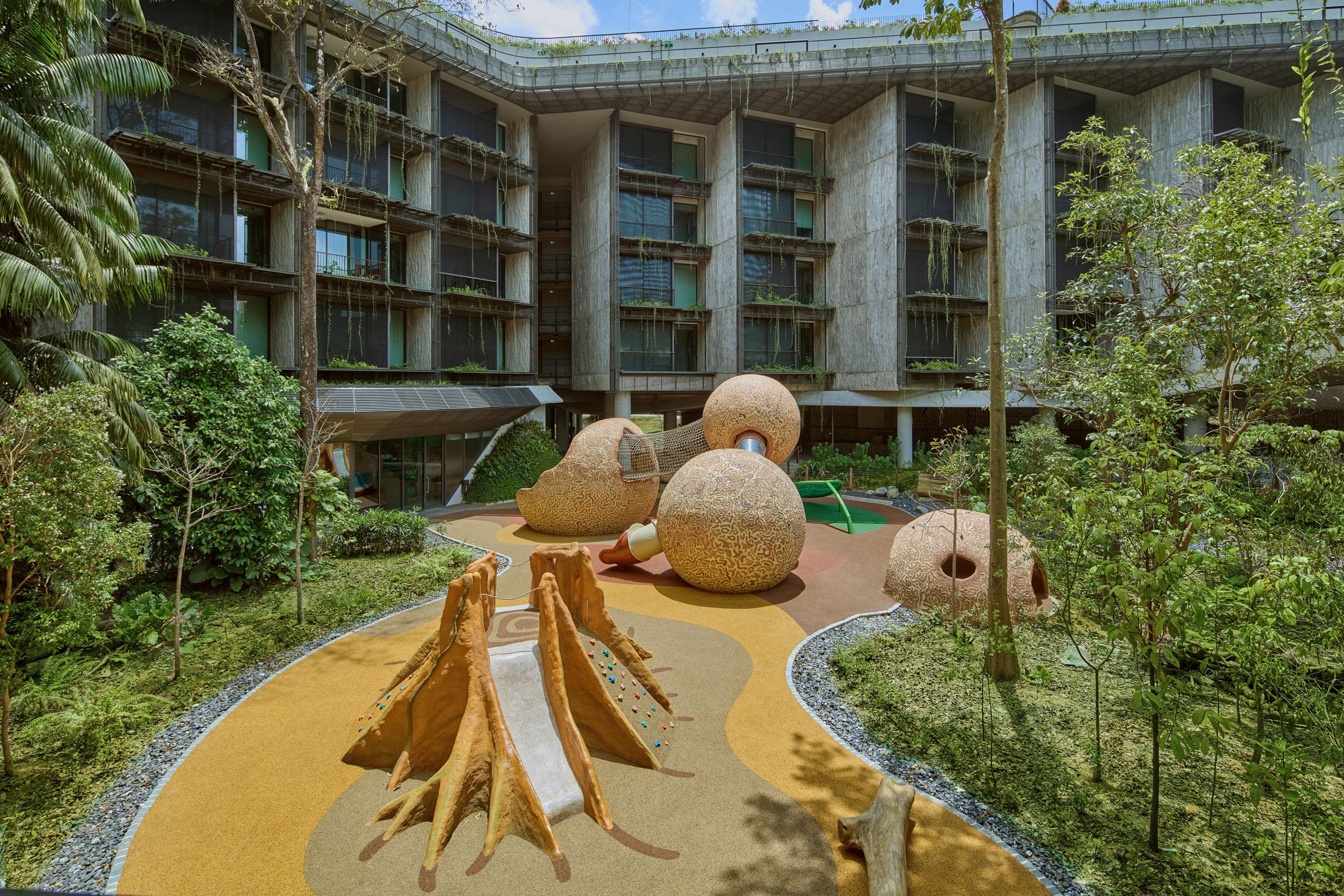 Outdoor area at eco-hotel by WOW Architects