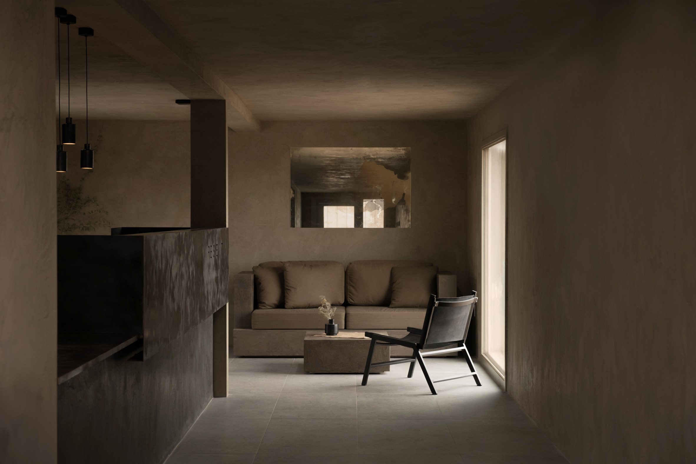Hotel reception area decorated with earth-toned textured plaster