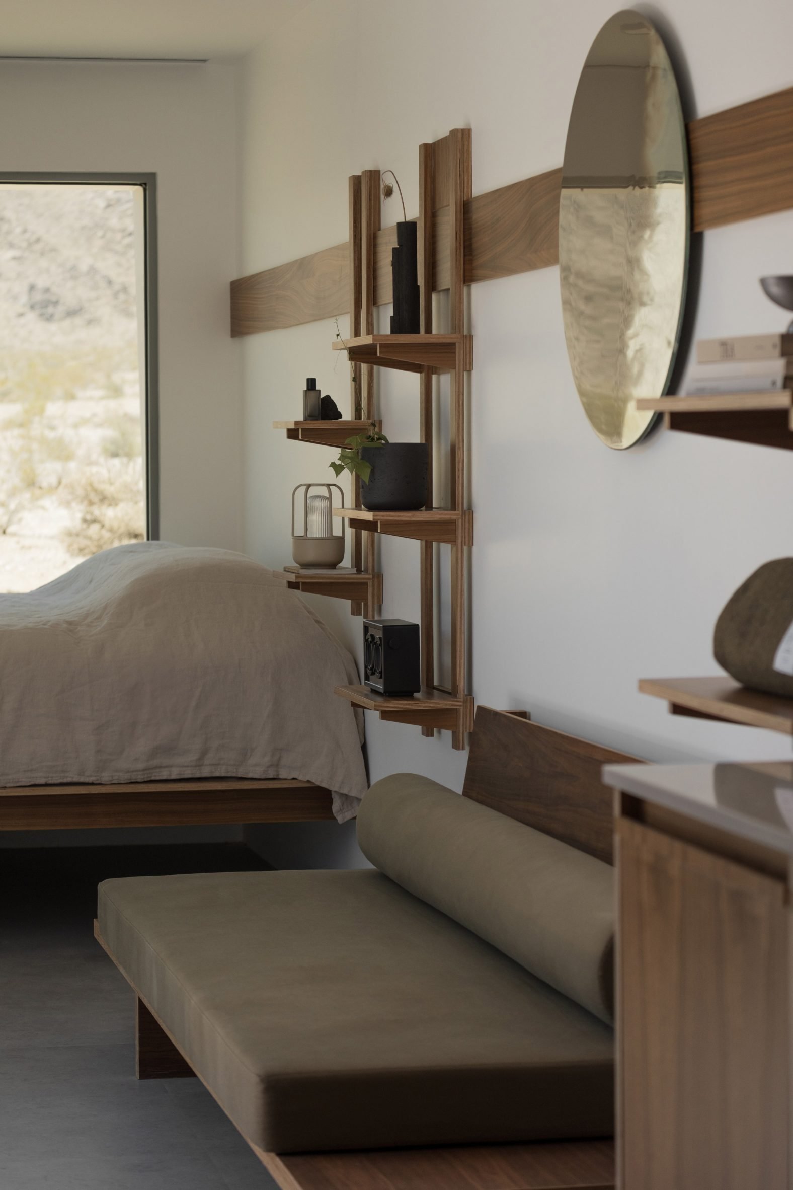 Container outfitted with simple wooden furniture